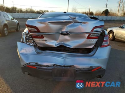 Zdjęcie 6 z 11 samochodu: 2013 FORD TAURUS SEL VIN:1FAHP2E85DG196075 - miniatura