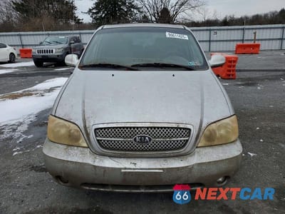 Piąte zdjęcie samochodu w środku: 2005 KIA SEDONA EX VIN:KNDUP132456769993 - miniatura