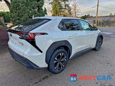 Czwarte zdjęcie samochodu z boku: 2023 SUBARU SOLTERRA PREMIUM VIN:JTMABABA8PA028708 - miniatura