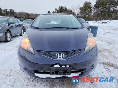 Piąte zdjęcie samochodu w środku: 2010 HONDA FIT VIN:JHMGE8H21AS001621 - miniatura