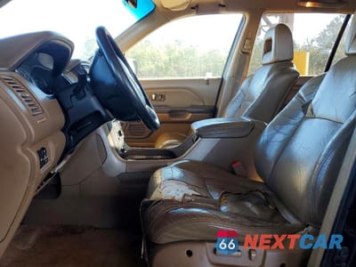 Zdjęcie 7 z 13 samochodu: 2004 HONDA PILOT EXL VIN:2HKYF18664H572490 - miniatura