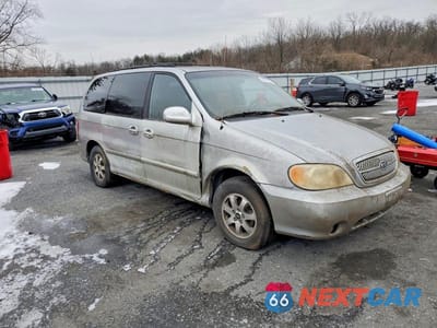Czwarte zdjęcie samochodu z boku: 2005 KIA SEDONA EX VIN:KNDUP132456769993 - miniatura