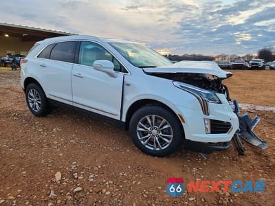 Czwarte zdjęcie samochodu z boku: 2022 CADILLAC XT5 PREMIUM LUXURY VIN:1GYKNCRS0NZ169206 - miniatura