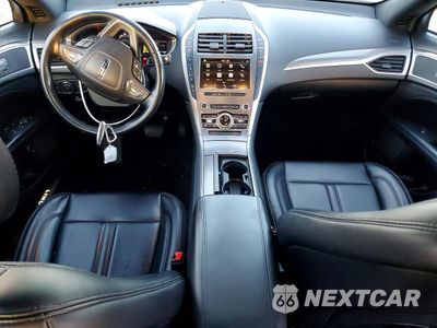 Zdjęcie 8 z 14 samochodu: 2019 LINCOLN MKZ VIN:3LN6L5KUXKR604975 - miniatura
