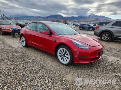 Czwarte zdjęcie samochodu z boku: 2021 TESLA MODEL 3 VIN:5YJ3E1EB3MF044547 - miniatura
