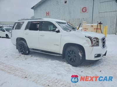 Czwarte zdjęcie samochodu z boku: 2019 GMC YUKON SLT VIN:1GKS2BKC2KR347631 - miniatura