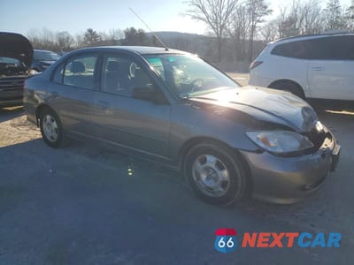 Czwarte zdjęcie samochodu z boku: 2005 HONDA CIVIC HYBRID VIN:JHMES95695S013180 - miniatura