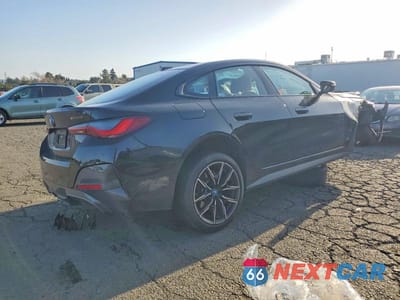 Trzecie zdjęcie samochodu z tyłu: 2022 BMW I4 EDRIVE 40 VIN:WBY73AW0XNFN08014 - miniatura