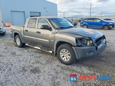 Czwarte zdjęcie samochodu z boku: 2006 MITSUBISHI RAIDER VIN:1Z7HT38K36S543040 - miniatura