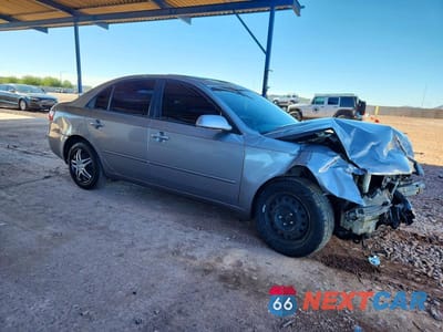 Czwarte zdjęcie samochodu z boku: 2006 HYUNDAI SONATA GL VIN:KMHET46CX6A125138 - miniatura