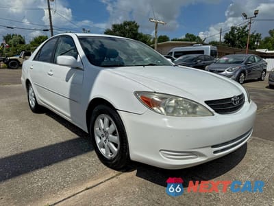 2002 TOYOTA CAMRY LE 4T1BE32K52U027812 - główne zdjęcie licytacji z USA - miniatura