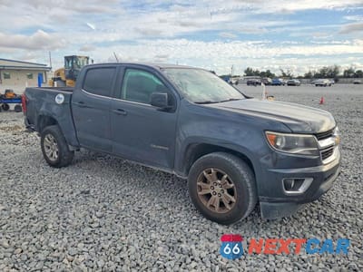 Czwarte zdjęcie samochodu z boku: 2018 CHEVROLET COLORADO LT VIN:1GCGSCEN3J1158925 - miniatura