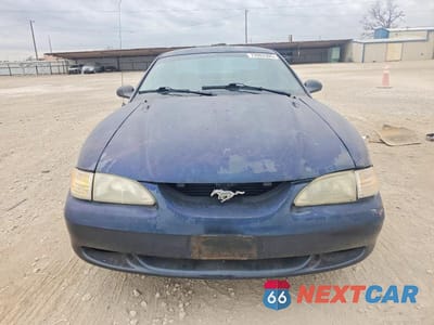 Piąte zdjęcie samochodu w środku: 1997 FORD MUSTANG VIN:1FALP4047VF201438 - miniatura