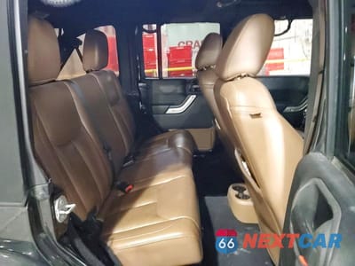 Zdjęcie 11 z 12 samochodu: 2015 JEEP WRANGLER UNLIMITED SAHARA VIN:1C4HJWEG6FL528447 - miniatura