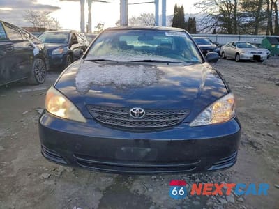 Piąte zdjęcie samochodu w środku: 2002 TOYOTA CAMRY LE VIN:4T1BE32K02U060409 - miniatura