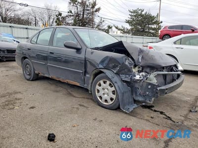 Czwarte zdjęcie samochodu z boku: 2002 NISSAN SENTRA XE VIN:3N1CB51D72L685113 - miniatura