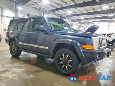 Czwarte zdjęcie samochodu z boku: 2009 JEEP COMMANDER LIMITED VIN:1J8HG58P19C501299 - miniatura