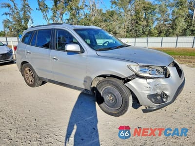 Czwarte zdjęcie samochodu z boku: 2012 HYUNDAI SANTA FE LIMITED VIN:5XYZK3ABXCG103816 - miniatura