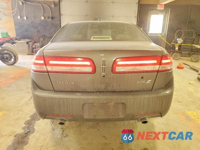 Zdjęcie 6 z 13 samochodu: 2010 LINCOLN MKZ VIN:3LNHL2GC1AR751272 - miniatura