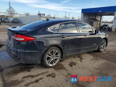 Trzecie zdjęcie samochodu z tyłu: 2019 FORD FUSION TITANIUM VIN:3FA6P0RU8KR117409 - miniatura