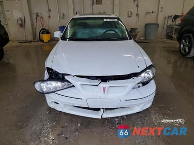 Piąte zdjęcie samochodu w środku: 2001 PONTIAC GRAND AM GT VIN:1G2NW12E41M584551 - miniatura