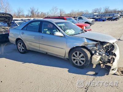 Czwarte zdjęcie samochodu z boku: 2004 TOYOTA CAMRY LE VIN:4T1BE30K34U902603 - miniatura