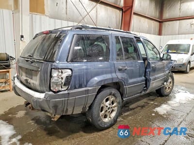 Trzecie zdjęcie samochodu z tyłu: 2003 JEEP GRAND CHEROKEE LAREDO VIN:1J8GW48S83C512384 - miniatura