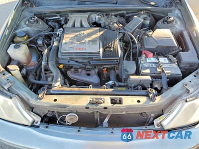 Zdjęcie 11 z 14 samochodu: 2001 TOYOTA AVALON XL VIN:4T1BF28B91U128882 - miniatura