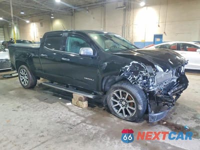 Czwarte zdjęcie samochodu z boku: 2017 GMC CANYON DENALI VIN:1GTG6EEN7H1150613 - miniatura