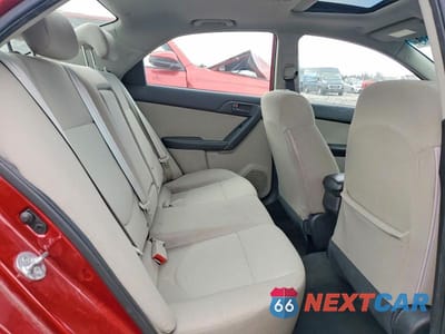 Zdjęcie 10 z 11 samochodu: 2010 KIA FORTE EX VIN:KNAFU4A22A5220988 - miniatura