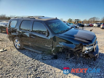 Czwarte zdjęcie samochodu z boku: 2014 CHEVROLET TAHOE C1500 LT VIN:1GNSCBE01ER217264 - miniatura