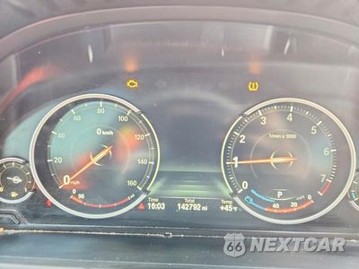 Zdjęcie 9 z 11 samochodu: 2014 BMW 740 I VIN:WBAYA6C57ED144703 - miniatura
