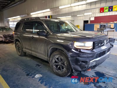 Czwarte zdjęcie samochodu z boku: 2026 HONDA PASSPORT TRAILSPORT ELITE VIN:5FNYF9H8XTB044691 - miniatura