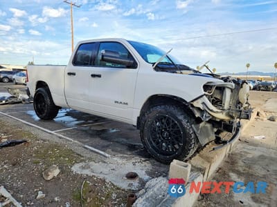 Czwarte zdjęcie samochodu z boku: 2020 RAM 1500 TRADESMAN VIN:1C6SRECG6LN386023 - miniatura