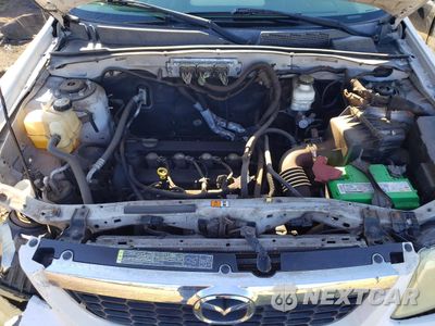 Zdjęcie 12 z 12 samochodu: 2011 MAZDA TRIBUTE I VIN:4F2CY0C7XBKM00847 - miniatura