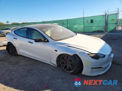 Czwarte zdjęcie samochodu z boku: 2023 TESLA MODEL S VIN:5YJSA1E65PF525124 - miniatura