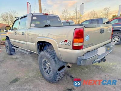 Trzecie zdjęcie samochodu z tyłu: 2003 GMC SIERRA K1500 HEAVY DUTY VIN:1GTGK13UX3F131614 - miniatura