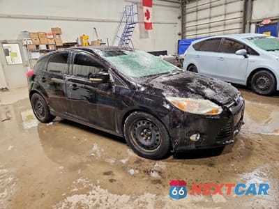 Czwarte zdjęcie samochodu z boku: 2012 FORD FOCUS SE VIN:1FAHP3K28CL228349 - miniatura