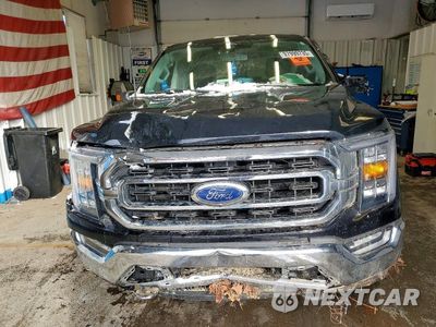Piąte zdjęcie samochodu w środku: 2021 FORD F150 SUPERCREW VIN:1FTFW1ED0MFC97431 - miniatura