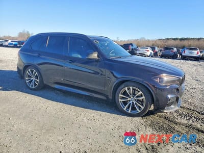 Czwarte zdjęcie samochodu z boku: 2014 BMW X5 XDRIVE50I VIN:5UXKR6C58E0C03820 - miniatura