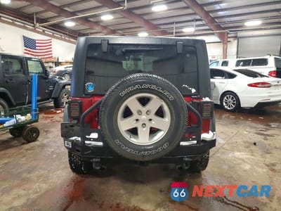 Zdjęcie 6 z 14 samochodu: 2012 JEEP WRANGLER UNLIMITED SPORT VIN:1C4BJWDG0CL279436 - miniatura