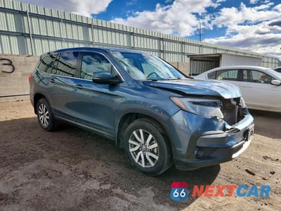 Czwarte zdjęcie samochodu z boku: 2021 HONDA PILOT EXL VIN:5FNYF6H55MB087566 - miniatura