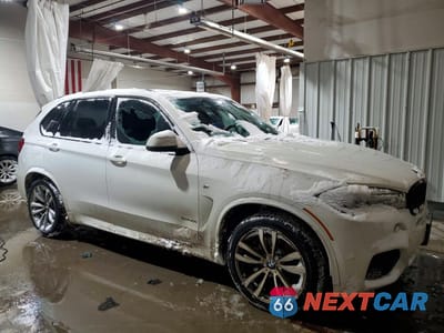 Czwarte zdjęcie samochodu z boku: 2014 BMW X5 XDRIVE50I VIN:5UXKR6C50E0C02161 - miniatura