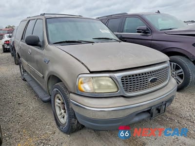 Czwarte zdjęcie samochodu z boku: 2002 FORD EXPEDITION VIN:1FMRU15WX2LA70391 - miniatura