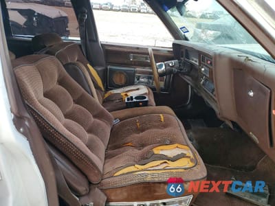 Zdjęcie 7 z 12 samochodu: 1984 OLDSMOBILE 98 REGENCY VIN:1G3AG69YXEM807086 - miniatura