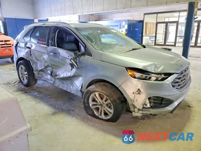 Czwarte zdjęcie samochodu z boku: 2020 FORD EDGE SEL VIN:2FMPK4J90LBB06699 - miniatura