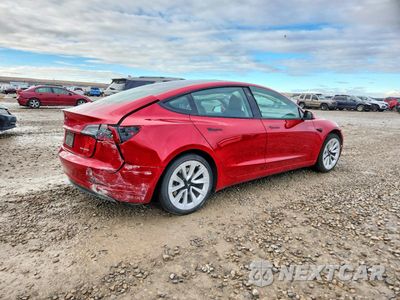 Trzecie zdjęcie samochodu z tyłu: 2021 TESLA MODEL 3 VIN:5YJ3E1EB3MF044547 - miniatura