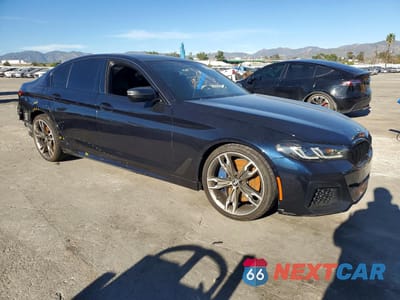 Czwarte zdjęcie samochodu z boku: 2021 BMW M550XI VIN:WBA13BK00MCF75241 - miniatura