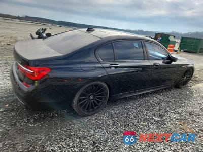 Trzecie zdjęcie samochodu z tyłu: 2017 BMW 740 I VIN:WBA7E2C33HG741003 - miniatura