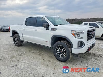 Czwarte zdjęcie samochodu z boku: 2021 GMC SIERRA K1500 AT4 VIN:3GTP9EEL9MG368912 - miniatura